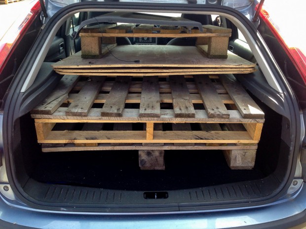 Car boot full of pallets for backgrounds
